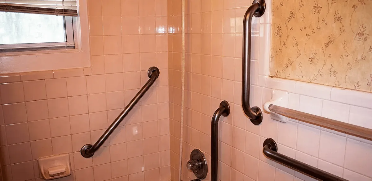 Shower grab bar installation for bathroom safety and accessibility in Boston, MA
