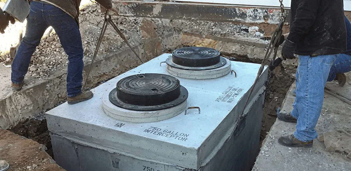 Grease trap installation for a commercial property drainage system in Boston, MA