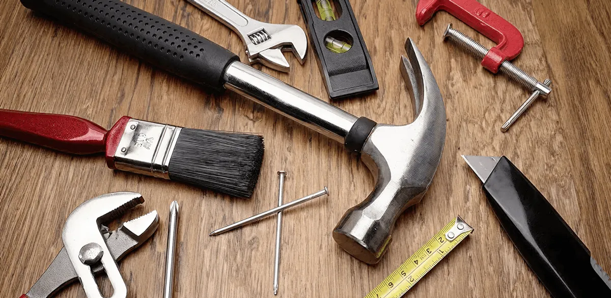 Handyman tools laid out for home repair and maintenance work in Boston, MA