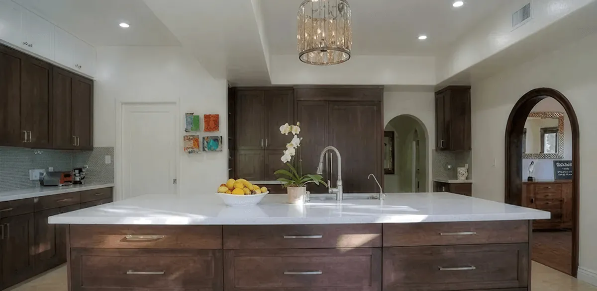 Cabinet refacing project with updated kitchen cabinets and island in Boston, MA